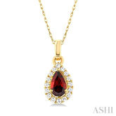 5x3 MM Pear Shape Garnet and 1/20 Ctw Single Cut Diamond Halo Semi-Precious Pendant with Chain in 10K Yellow Gold