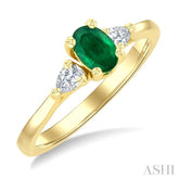 1/5 Ctw 3-Stone Oval Cut 6X4MM Emerald and Pear Cut Diamond Precious Ring in 14K Yellow Gold