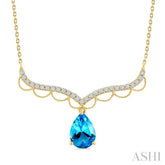 9X6 MM Pear Cut Blue Topaz and Round Cut 1/5 Ctw Diamond Semi-Precious Fashion Necklace in 10K Yellow Gold