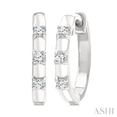 1/10 Ctw Round Cut Diamond Petite Huggie Earrings in 10K White Gold
