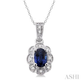 6x4 MM Oval Cut Sapphire and 1/20 Ctw Single Cut Diamond Pendant in Sterling Silver with Chain