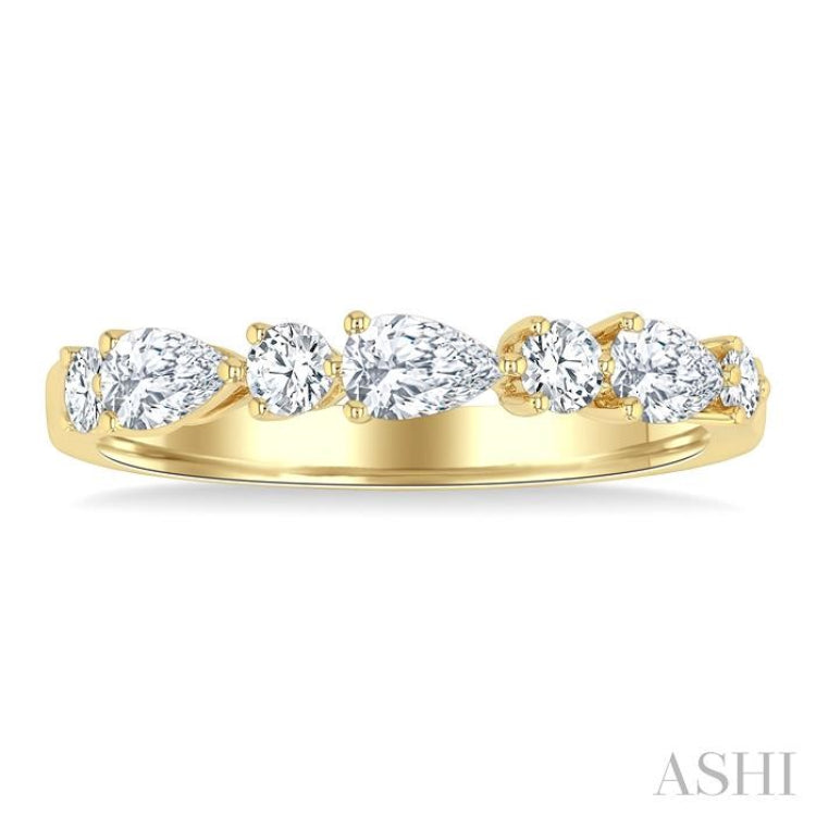 5/8 Ctw Pear and Round Cut Diamond Fashion Band in 14K Yellow Gold