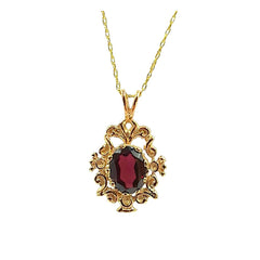 APPRAISED $250- 10KT Yellow Gold Scroll Designed Pendant with 1 Oval Garnet (8x6)