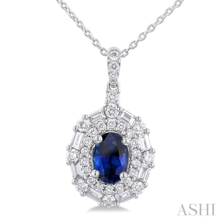 7x5 MM Oval Cut Sapphire and 5/8 Ctw Baguette & Round Cut Diamond Halo Precious Pendant With Chain in 14K White Gold