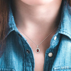 8x6 MM Oval Cut Garnet and 1/3 Ctw Round Cut Diamond Pendant in 14K White Gold with Chain