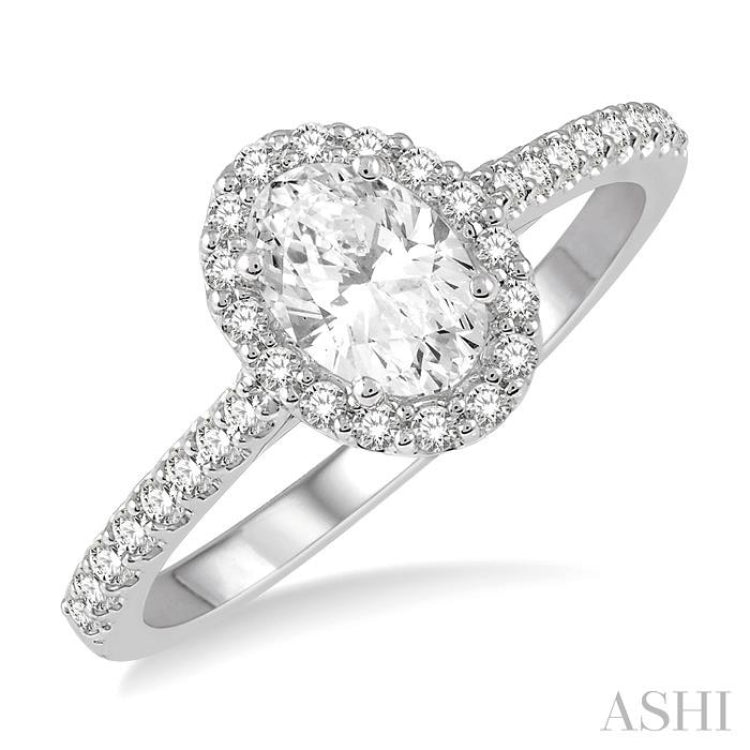 1 1/10 ctw Oval Halo Round Cut Diamond Engagement Ring With 3/4 ct Oval Cut Center Stone in 14K White Gold