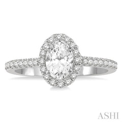 1 1/10 ctw Oval Halo Round Cut Diamond Engagement Ring With 3/4 ct Oval Cut Center Stone in 14K White Gold