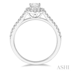 1 1/10 ctw Oval Halo Round Cut Diamond Engagement Ring With 3/4 ct Oval Cut Center Stone in 14K White Gold