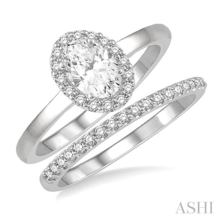 3/4 Ctw Round Cut Diamond Wedding Set With 5/8 Ct Oval Cut Engagement Ring and 1/6 Ct Round Cut Diamond Wedding Band in 14K White Gold
