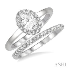 3/4 Ctw Round Cut Diamond Wedding Set With 5/8 Ct Oval Cut Engagement Ring and 1/6 Ct Round Cut Diamond Wedding Band in 14K White Gold