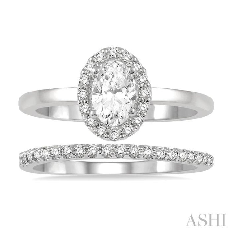 3/4 Ctw Round Cut Diamond Wedding Set With 5/8 Ct Oval Cut Engagement Ring and 1/6 Ct Round Cut Diamond Wedding Band in 14K White Gold