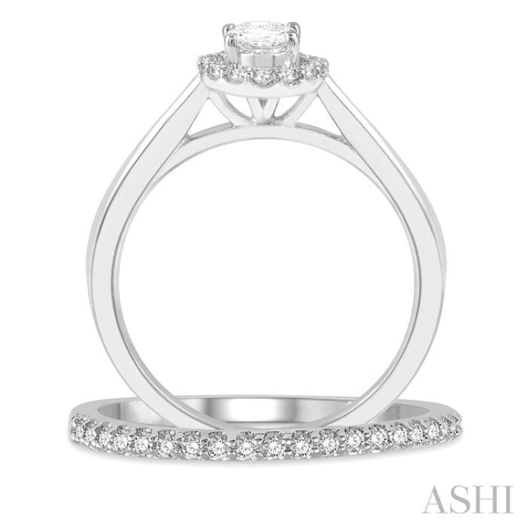 3/4 Ctw Round Cut Diamond Wedding Set With 5/8 Ct Oval Cut Engagement Ring and 1/6 Ct Round Cut Diamond Wedding Band in 14K White Gold