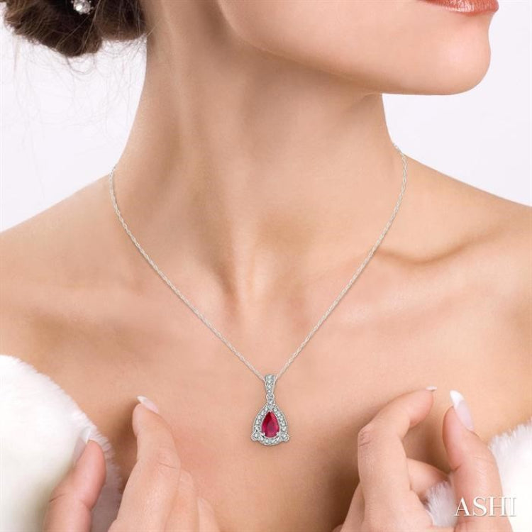 6x4 MM Pear Shape Ruby and 1/10 Ctw Round Cut Diamond Pendant in 14K White Gold with Chain