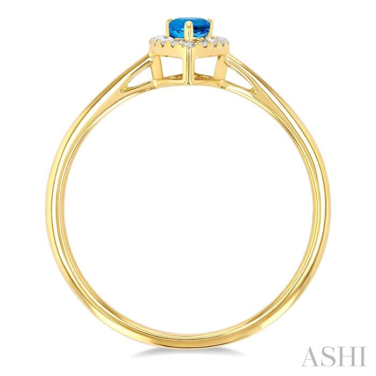 5x3 MM Pear Shape Blue Topaz and 1/20 Ctw Single Cut Diamond Halo Semi-Precious Ring in 14K Yellow Gold