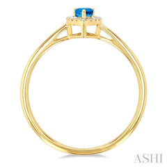 5x3 MM Pear Shape Blue Topaz and 1/20 Ctw Single Cut Diamond Halo Semi-Precious Ring in 14K Yellow Gold