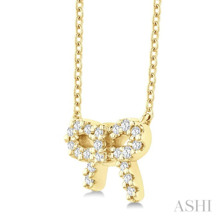1/8 Ctw Bow Round Cut Diamond Ribbon Petite Fashion Pendant With Chain in 10K Yellow Gold