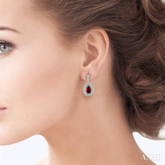 9x6 MM Pear Shape Garnet and 1/20 Ctw Round Cut Diamond Earrings in Sterling Silver