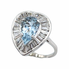 APPRAISED $4000- 14Kt. White Gold One Pear Shaped Aquamarine Surrounded by Twenty-Nine Baguette Diamonds in a Heart Halo