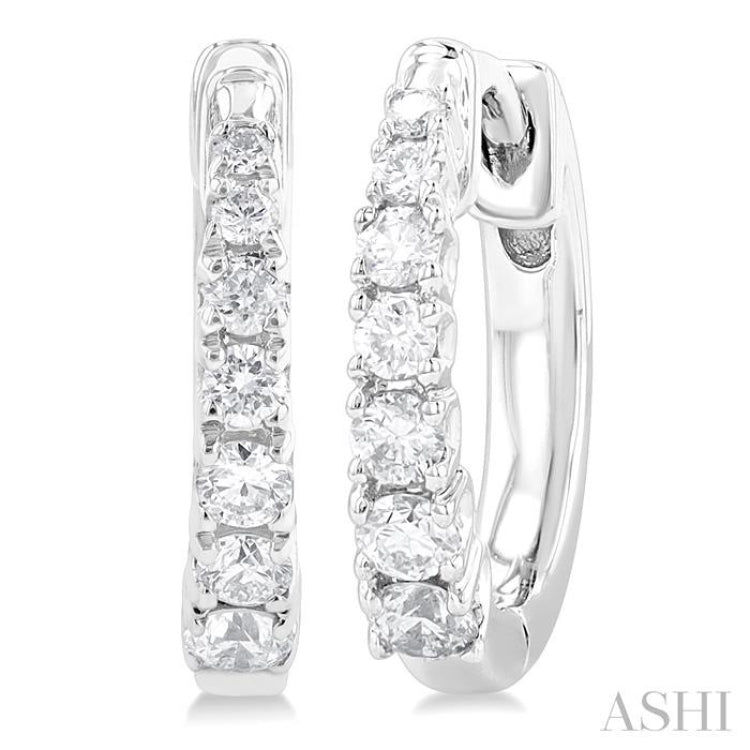 1/4 Ctw Graduated Round Cut Diamond Fashion Huggie Petites in 10K White Gold