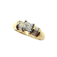 APPRAISED $2250- 14Kt. Yellow Gold Ring with One Princess Cut Diamond and Eight Baguette Diamonds