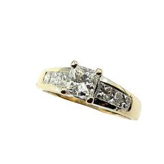 APPRAISED $7000- 18Kt. White Gold Ring with One Princess Cut Diamond Accented by Six Princess Cut Diamonds