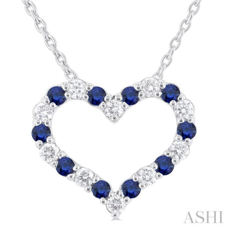 1.4 MM Round Cut Sapphire and 1/8 Ctw Open Heart Round Cut Diamond Precious Fashion Pendant With Chain in 14K White Gold