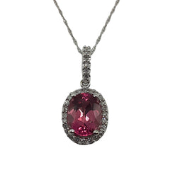 APPRAISED $900 - 14kt White Gold Pendant with 1 Oval-Shaped Pink Tourmaline (8x6mm) and 30 Single Cut Diamonds - T. - .12ct in a Halo Design 