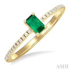 5x3 MM Emerald Shape Emerald and 1/10 Ctw Petite Round Cut Diamond Precious Fashion Ring in 10K Yellow Gold