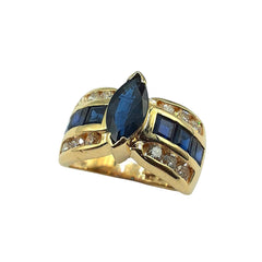 APPRAISED $1900 - 14kt Yellow Gold Band with 6 Square Sapphires (3.2mm) and 12 Round Brilliant Diamonds - T. - .60ct and 1 Marquise Sapphire Center (10x5mm)