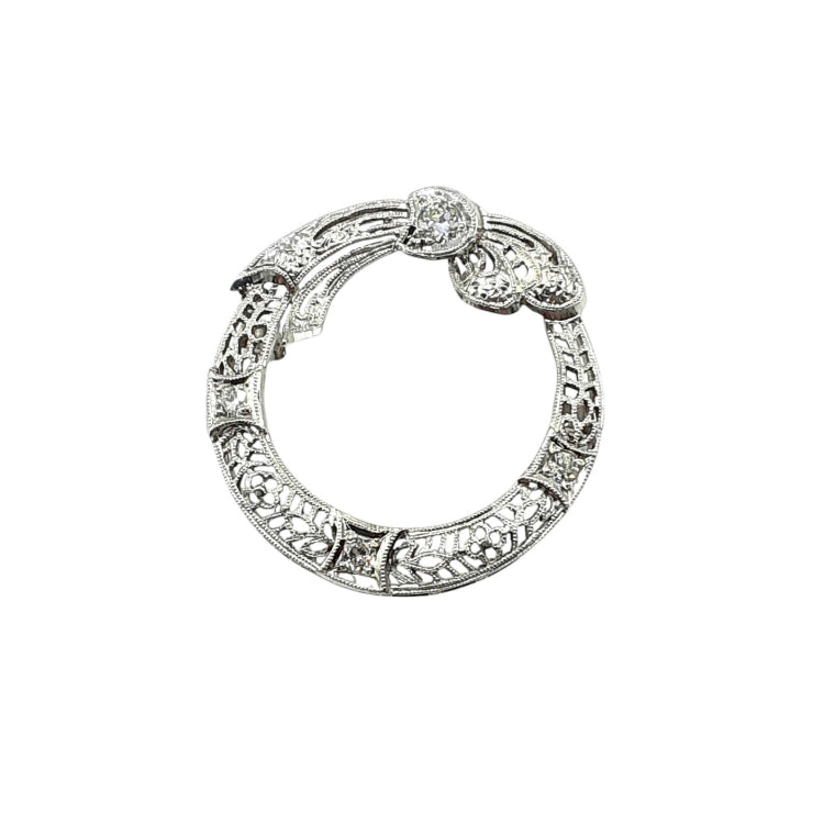 APPRAISED $1500- 18KT White Gold Filigree Wreath Pendant with 1 Larger Old European Cut Diamond and 3 Smaller -T-.24CT 
Color: GH
Clarity: VS
