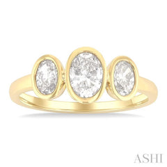1 Ctw 3-Stone Bezel Set Oval Cut Diamond Ring in 14K Yellow Gold