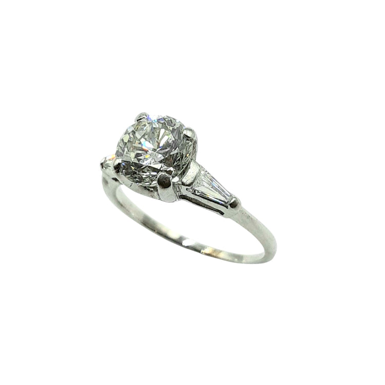 APPRAISED $9900 - 14kt White Gold Band with 1 Round Brilliant Diamond Center - T. - 1.24ct and 2 Tapered Baguette Diamond on Sides - T. - .18ct 