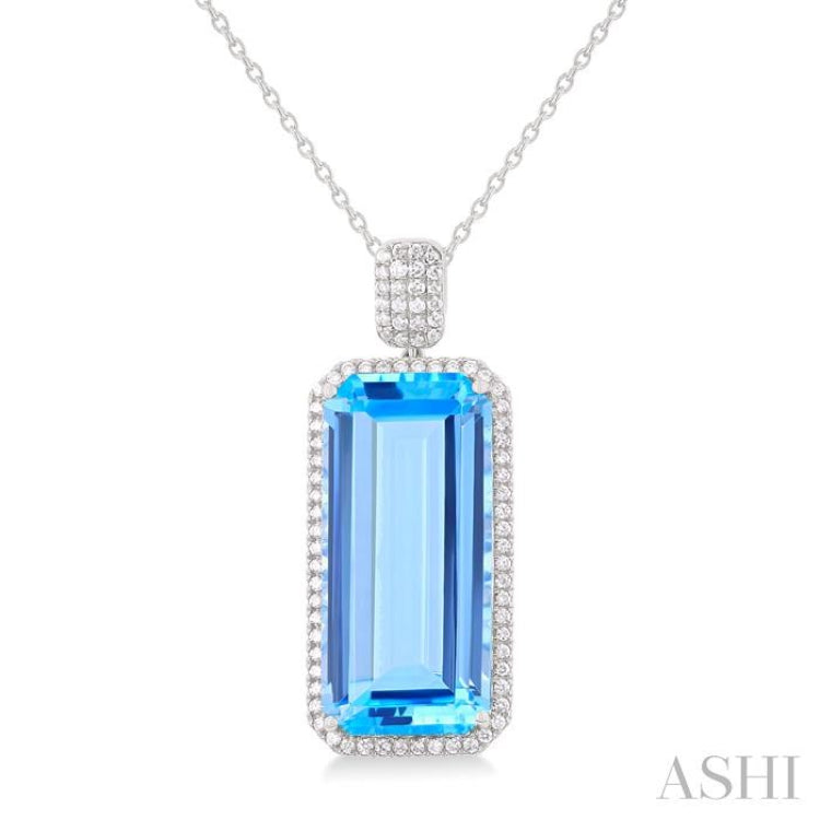 26x12 MM Emerald Cut Blue Topaz and 1/2 Ctw Round Cut Diamond Halo Semi-Precious Pendant With Paperclip Chain in 14K White Gold