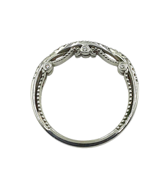 APPRAISED $2900 - 18KT White Gold Band with 52 Round Brilliant Diamonds - T. - .30ct in a Infinity Design with Scroll Under Gallery