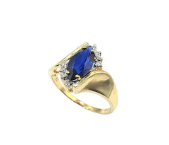 APPRAISED $300- 10KT Yellow Gold Ring with a Synthetic Sapphire Center Stone and Diamonds