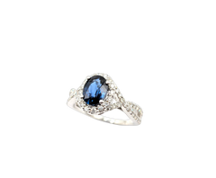 APPRAISED $5356- 14KT White Gold Ring with a Oval Sapphire surrounded by a Diamond Halo & Along the Sides