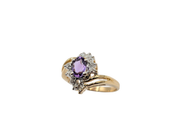 APPRAISED $750- 14KT Yellow Gold Bypass Ring with a Oval Amethyst & Single Cut Diamonds