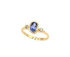 APPRAISED $500- 14KT Yellow Gold Ring with a Bezel Set Oval Tanzanite & Round Brilliant Diamonds