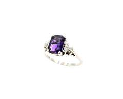 APPRAISED $750- 14KT White Gold Ring with an Emerald Cut Amethyst surrounded by Single Cut Diamonds