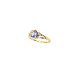 APPRAISED $700- 14KT Yellow Gold Ring with an Oval Tanzanite surrounded by Round Brilliant & Baguette Diamonds