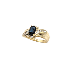 APPRAISED $700- 14KT Yellow Gold Ring with an Emerald Cut Sapphire surrounded by Single Cut Diamonds & Square Cut White Sapphires