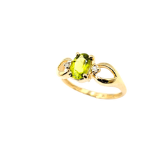 APPRAISED $500- 14KT Yellow Gold Ring with an Oval Peridot with Round Brilliant Diamonds