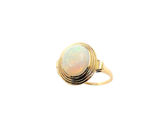 APPRAISED $600- 10KT Yellow Gold Ring with an Oval Opal in a Bezel Setting
