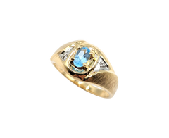 APPRAISED $600- 10KT Yellow Gold Satin Finish Ring with an Oval Blue Topaz and SIngle Cut Diamonds