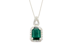 APPRAISED $6220- 14KT White Gold Pendant with an Emerald Cut Emerald surrounded by Diamonds
