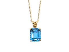 APPRAISED $600- 14KT Yellow Gold Emerald Cut Blue Topaz Pendant