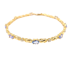APPRAISED $1000- 14KT Yellow Gold Infinity Style Bracelet with alternating Tanzanite and Diamonds